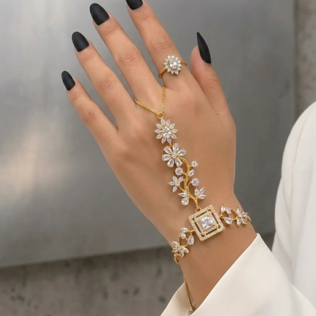 Traditional gold-plated Hathphool hand harness styled with a modern white formal blazer.